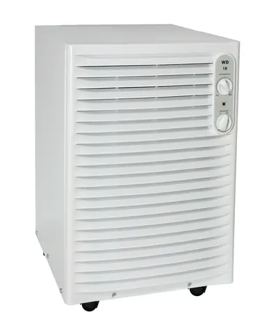 White household dehumidifier with front louvers and control dials